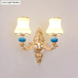 Gold Wall Mount Light With Cream Glass Bud Shade - Minimalist Living Room Lighting