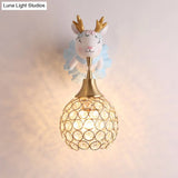Hollowed Ball Crystal 1 Head Wall Mount Light With Animal Decor - Artistic Bedside Fixture
