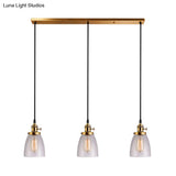 Industrial Aged Brass Dining Room Pendant Light Fixture With Tapered Clear Glass Shades - 3-Light