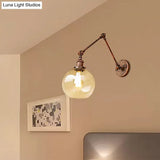 Industrial Bedroom Wall Sconce Lighting Fixture With Clear Glass Globe Shade - Black/Antique