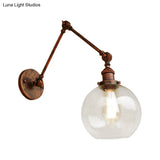 Industrial Bedroom Wall Sconce Lighting Fixture With Clear Glass Globe Shade - Black/Antique