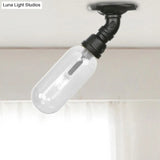 Industrial Black Ceiling Mounted Fixture - Oval Clear Glass Shade Semi Flush Mount With Pipe Design