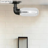 Industrial Black Ceiling Mounted Fixture - Oval Clear Glass Shade Semi Flush Mount With Pipe Design