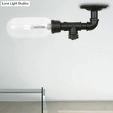 Industrial Black Ceiling Mounted Fixture - Oval Clear Glass Shade Semi Flush Mount With Pipe Design
