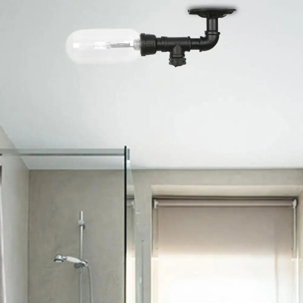 Industrial Black Ceiling Mounted Fixture - Oval Clear Glass Shade Semi Flush Mount With Pipe Design