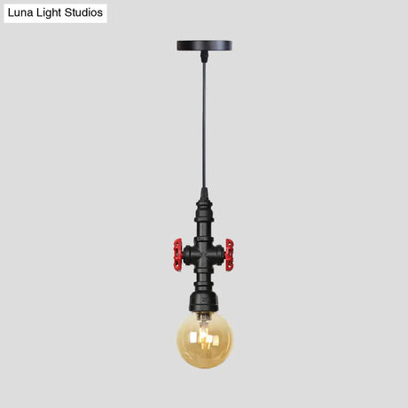Industrial Black Finish Amber Glass Pendant Lamp With Pipe Suspension - 1-Light Ball/Capsule