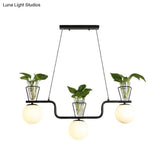 Industrial Black Island Light Fixture With Opal Glass Globe Pendant And Clear Pot - 3-Bulb