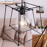 Industrial Black Metal Pendant Light With Trapezoid Cage Shade - Living Room Hanging Lamp