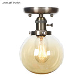 Industrial Bronze Globe Semi Flush Light With Clear/Amber Glass - Indoor Lighting Fixture