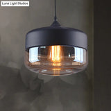 Industrial Cylinder Pendant Light With Brown Glass Shade - 1-Light Hanging Ceiling Fixture In Black