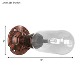 Industrial Pipe Wall Sconce: Clear Glass & Weathered Copper Finish 1-Light Capsule Lighting