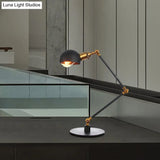 Industrial Style Black/Brass Domed Table Lamp With Adjustable Arm - Metallic 1-Bulb Lighting For