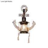 Industrial Style Wall Mount Oil Lamp With Clear Glass Shade And Black Metal Frame