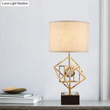 Interlocked Cube Table Lamp: Modern Metal 1-Light Night Light With Brass And Black Accents