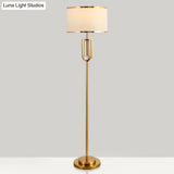 Intersected Frame Standing Light Traditional Bronze Metal Floor Lamp White Drum Shade