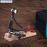 Iron Cross Legged Table Lamp With Industrial Led Valve Deco And Wood Base - Black Finish Perfect For