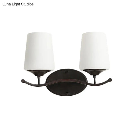 Ivory Glass Vanity Lighting With Iron Wavy Arm - Traditional Black Tapered Wall Light For Bedroom