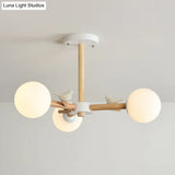Japanese-Inspired Bedroom Chandelier With Orb Shade Birds Wood And Glass In White