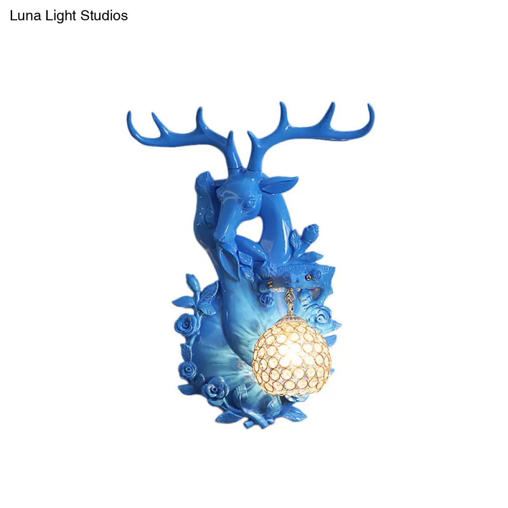 Loft Style Wall Mounted Sconce With Clear Crystal Shade Blue/Gold Finish And Deer Head Accent
