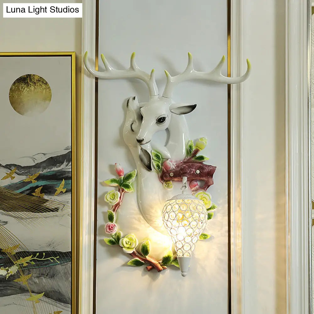 Loft Style Wall Mounted Sconce With Clear Crystal Shade Blue/Gold Finish And Deer Head Accent