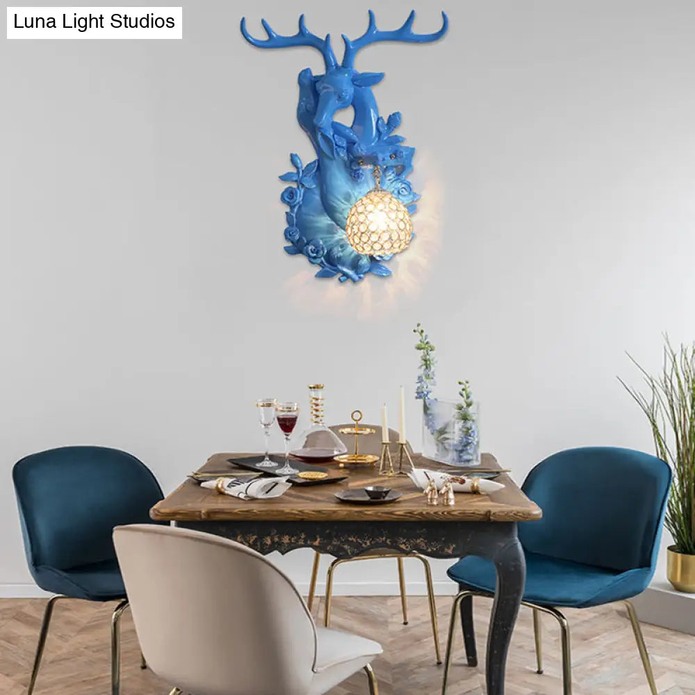 Loft Style Wall Mounted Sconce With Clear Crystal Shade Blue/Gold Finish And Deer Head Accent