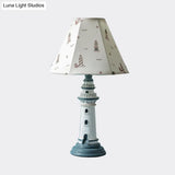 Mediterranean Tapered Night Light Fabric Table Lamp With Nautical Design And Lighthouse Base