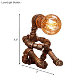 Metal Robot Table Light In Brass - Antique Finish 1 Head Nightstand Lamp For Coffee House