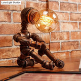 Metal Robot Table Light In Brass - Antique Finish 1 Head Nightstand Lamp For Coffee House