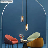 Mid Century Single Pendant: Smoke Grey Glass In Black Suspension Small Bottle Style
