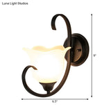 Milky Glass Wall Sconce With Floral Design And Scroll Arm For Elegant Country Decor