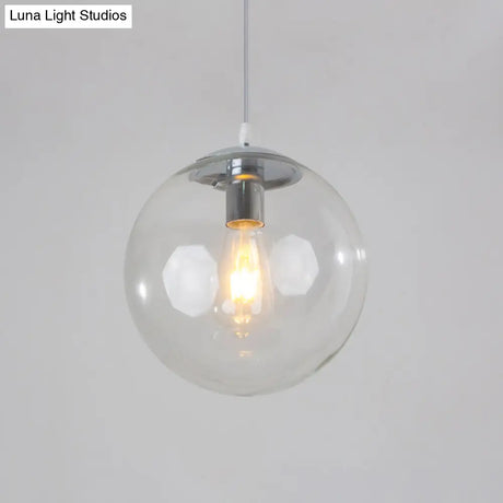 Sleek 1-Head Restaurant Pendant Lamp With Glass Sphere Shade Clear / 12