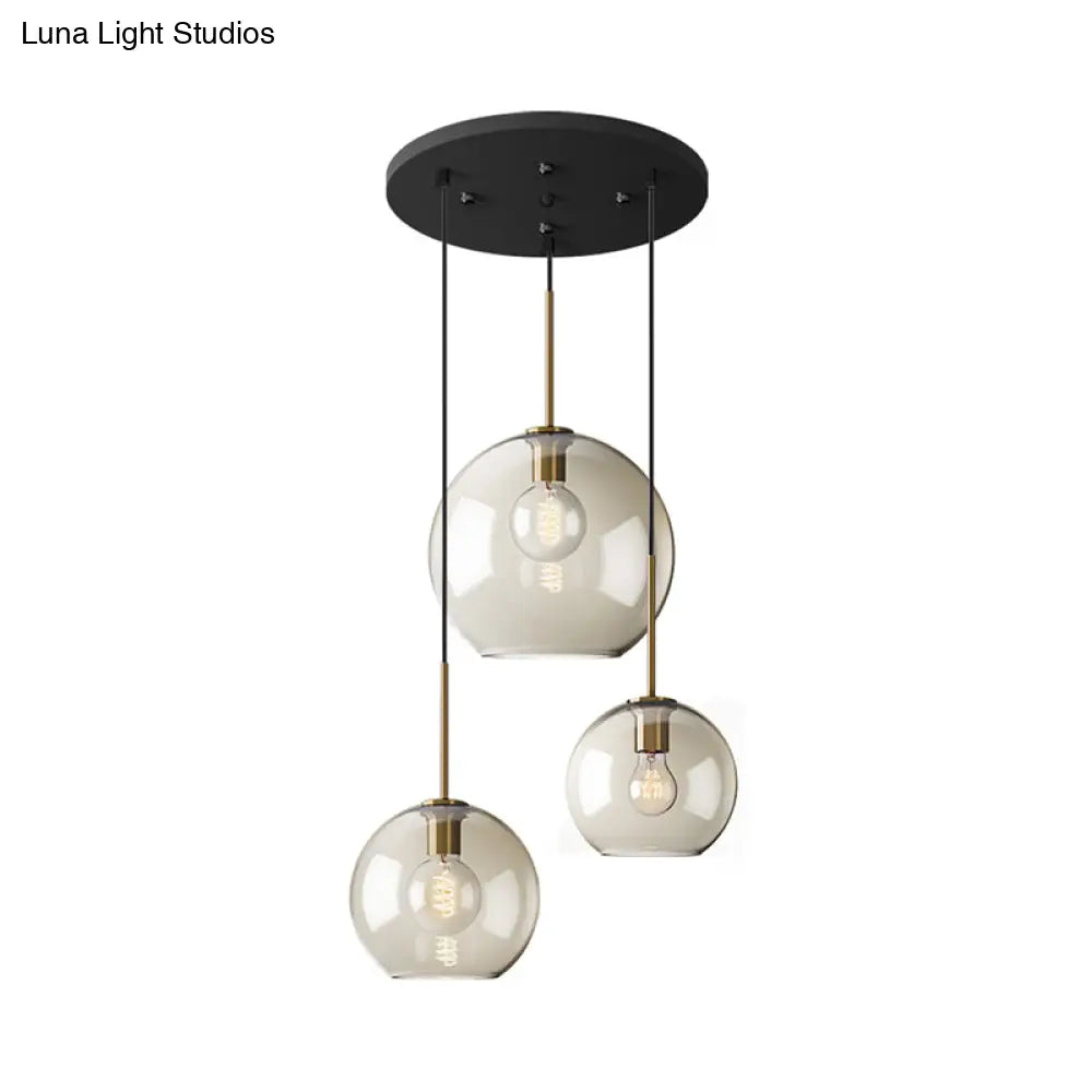 Minimalist 3-Light Pendant With Amber Glass Shade And Black Finish