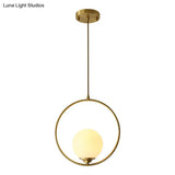 Minimalist Antique Gold Ball Ceiling Lamp With Cream Glass Shade And Ring Decoration