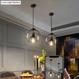 Minimalist Black Glass Pendant Light For Modern Dining Rooms