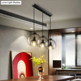 Minimalist Black Glass Pendant Light For Modern Dining Rooms