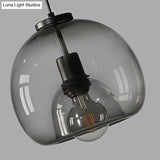 Minimalist Black Glass Pendant Light For Modern Dining Rooms