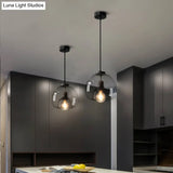 Minimalist Black Glass Pendant Light For Modern Dining Rooms