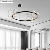 Minimalist Black Pendant Chandelier with Clear Glass Orb - Ideal Dining Room Lighting Fixture