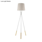 Minimalist Black/White Tapered Floor Lamp With Brass Accents