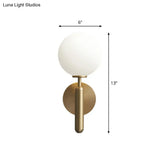 Minimalist Brass Wall Sconce With Cream Glass Shade - 1-Light Living Room Lighting