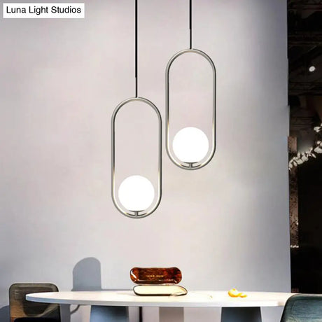 Minimalist Chrome Orb Pendant Light With White Glass Shade