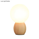 Minimalist Frosted Glass Bedside Table Lamp With Wooden Base - Orb Design