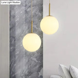 Minimalist Glass Pendant Light In White For Dining Room Table