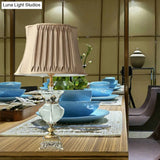 Minimalist Gold Bell Night Lamp With Clear K9 Crystal Shade And Stylish Urn-Shaped Base