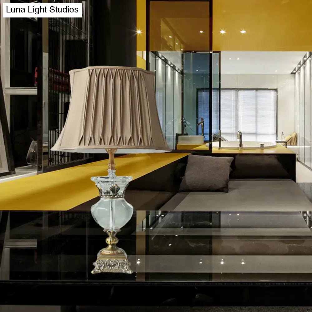 Minimalist Gold Bell Night Lamp With Clear K9 Crystal Shade And Stylish Urn-Shaped Base