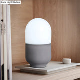 Minimalist Grey Cement Capsule Desk Light With Led Night Table Lamp And White Glass Shade