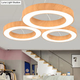 Minimalist LED Pendant Lamp for Meeting Rooms: Light Wood Circle Design with Metal Accents