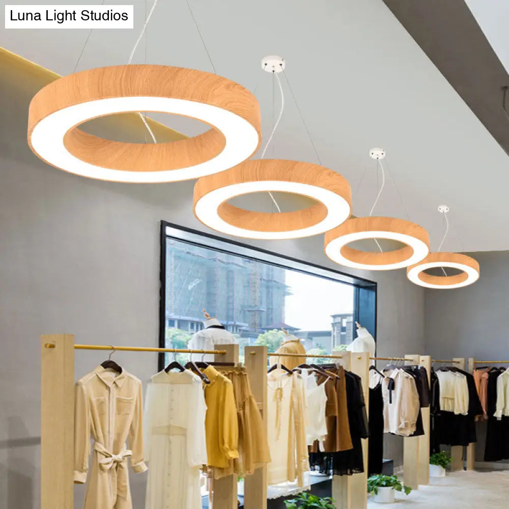 Minimalist LED Pendant Lamp for Meeting Rooms: Light Wood Circle Design with Metal Accents
