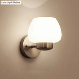 Minimalist Matte White Glass Bud Wall Light With Nickel Sconce For Modern Bedrooms