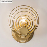 Minimalist Metallic Gold Swirling Wall Sconce - Elegant 1/2-Light Round Lighting Idea